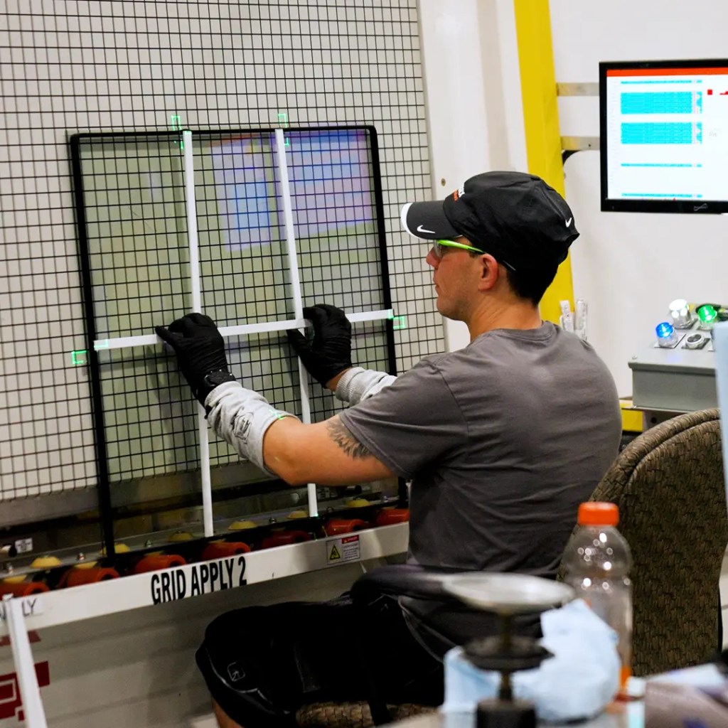 Knoxville Window Company | Replacement Windows & Installation Window manufacturer doing fitments on the window glass